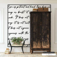 Love is Patient Bible verse peel and stick wallpaper in black and white cursive.