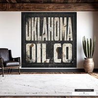 Large wall art and rustic sign featuring Oklahoma's oil industry history.