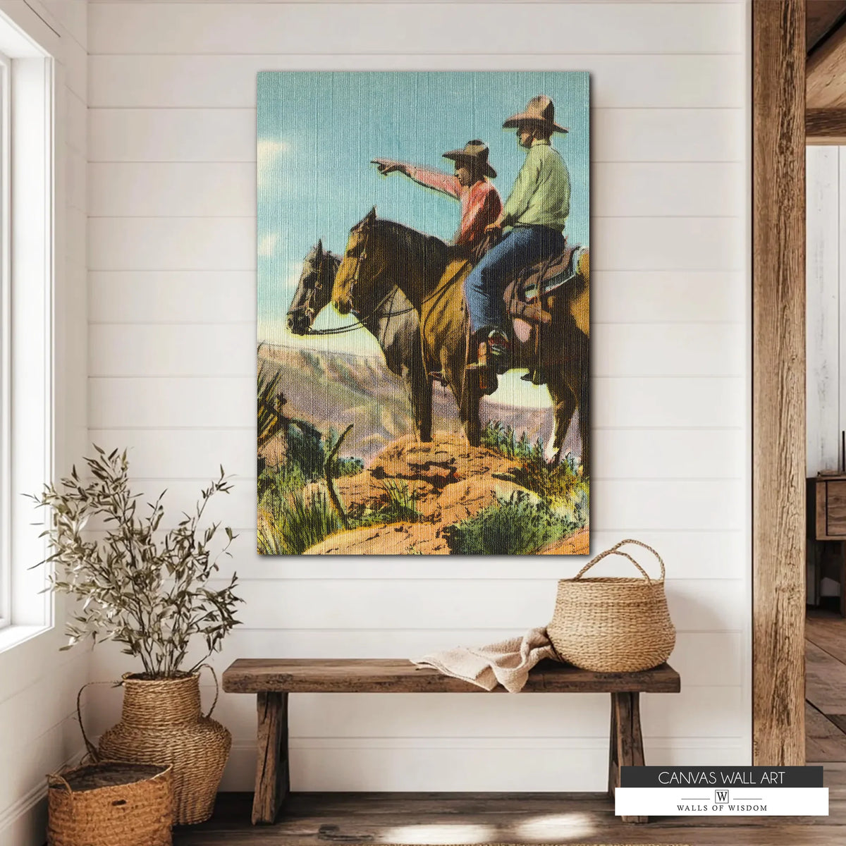 Vintage Western canvas wall art featuring two cowboys on horseback surveying the open frontier. The rugged landscape and earthy tones add rustic charm to any Western or Southwestern-inspired space.