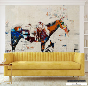 Innovative 'Wild at Heart' wallpaper with spray-painted effects on cowboy and horse figures.